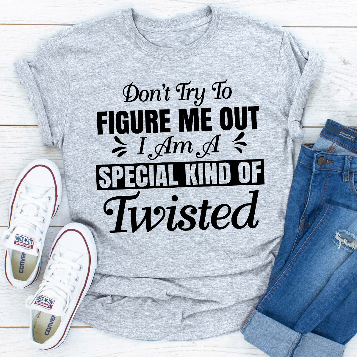 A stylish black t-shirt with the phrase 'Don't Try To Figure Me Out I'm A Special Kind Of Twisted' printed in bold white letters.