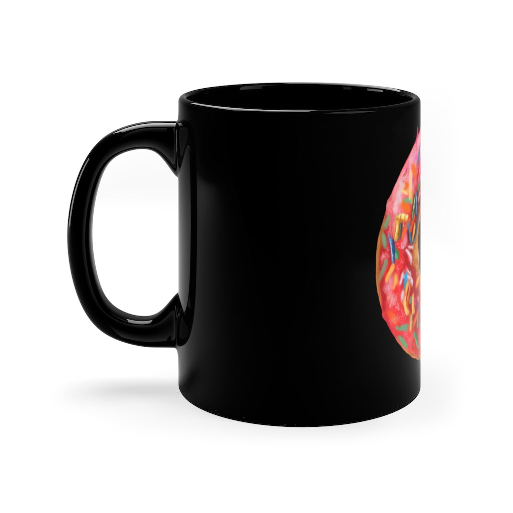 A sleek black ceramic mug with a C-handle, perfect for coffee or tea, showcasing its 11oz capacity and customizable design.