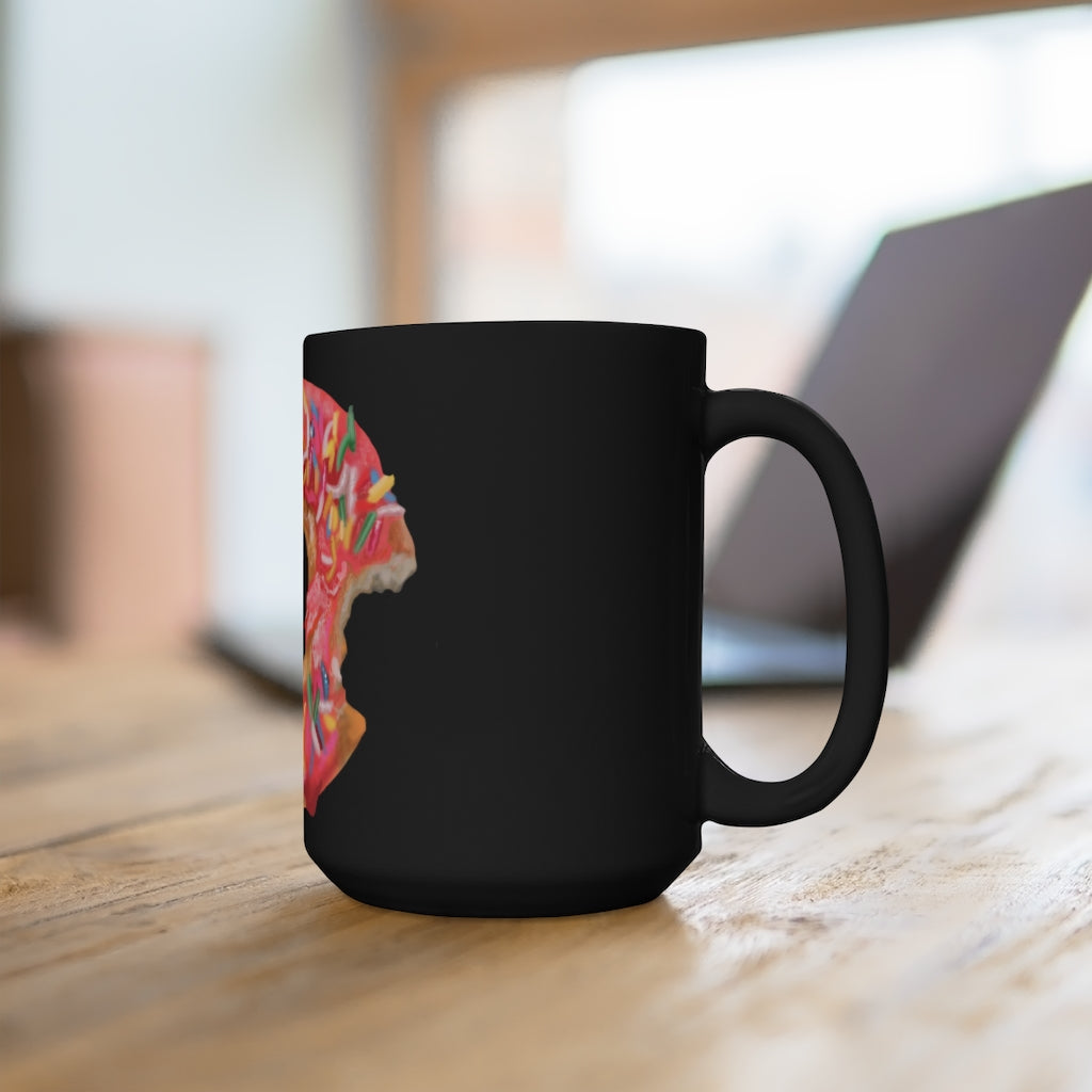 A stylish 15oz black ceramic mug with rounded corners and a C-handle, perfect for coffee and tea lovers.