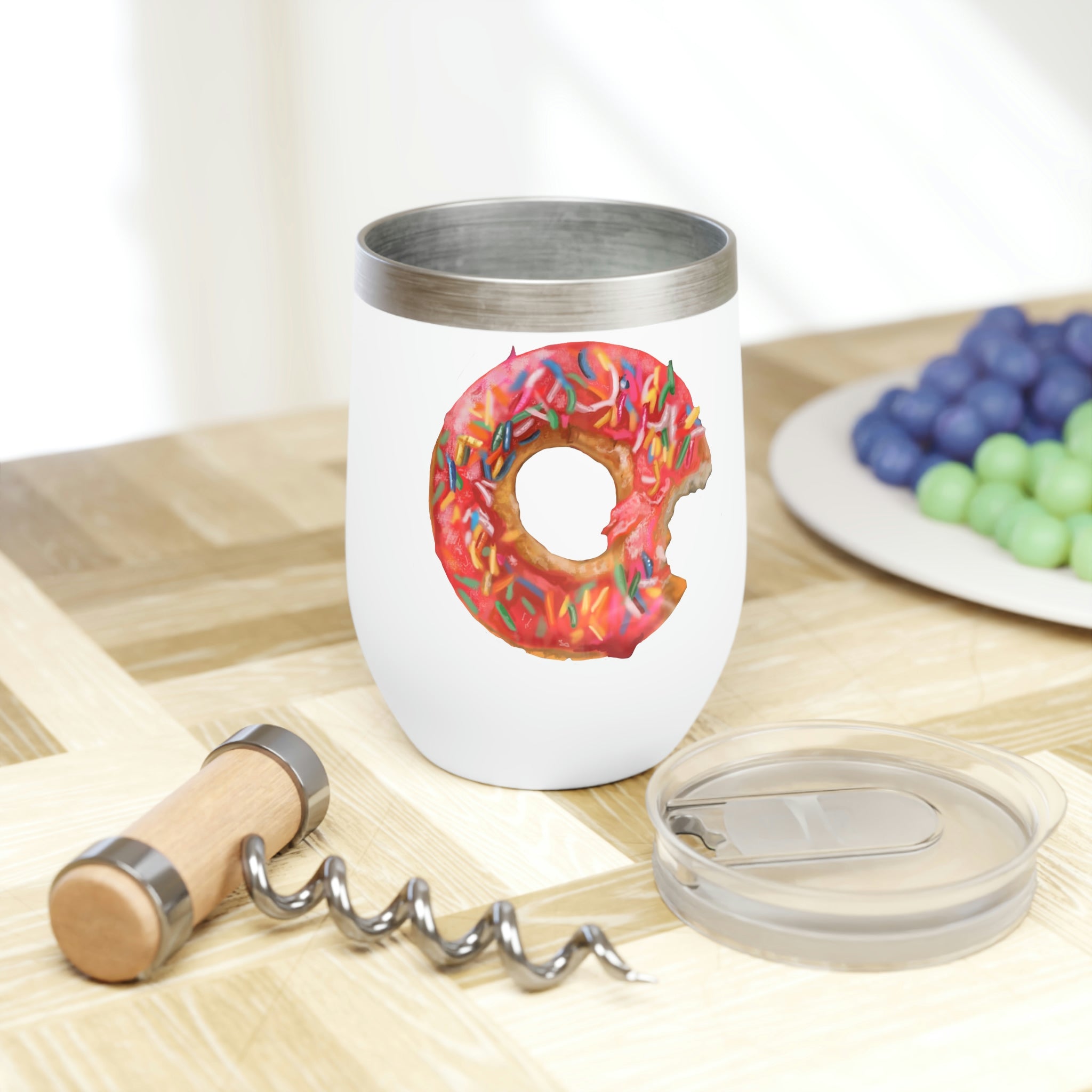 A stylish Donut Chill Wine Tumbler made of stainless steel, featuring a customizable design and double-insulated walls for temperature retention.