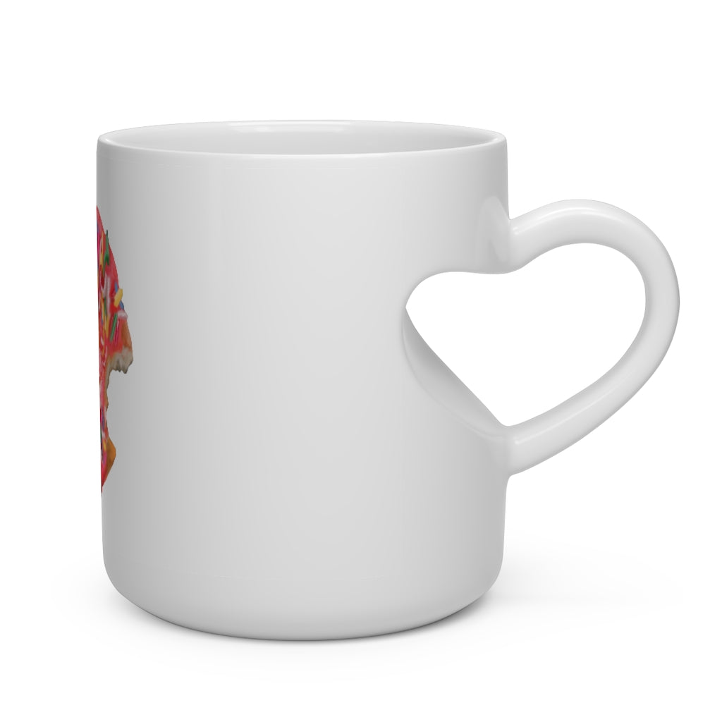 A white ceramic mug shaped like a heart with a heart-shaped handle, perfect for hot beverages.