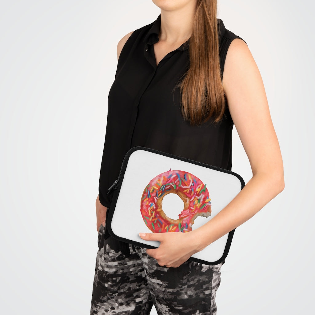 A stylish donut-themed laptop sleeve with a black polyester back, featuring dual zippers and water-resistant neoprene material.