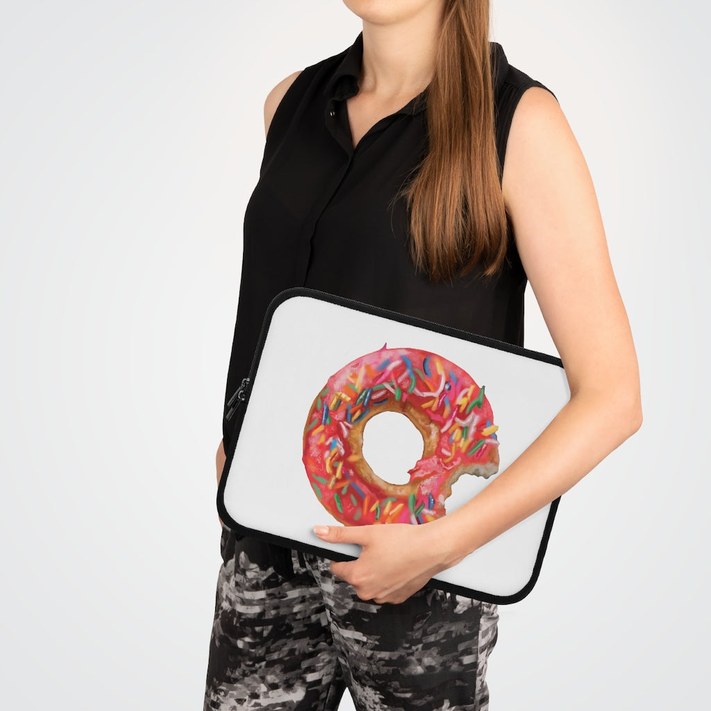 A stylish donut-themed laptop sleeve with a black polyester back, featuring dual zippers and water-resistant neoprene material.