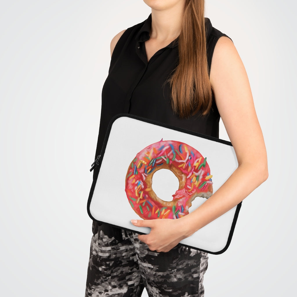 A stylish donut-themed laptop sleeve with a black polyester back, featuring dual zippers and water-resistant neoprene material.