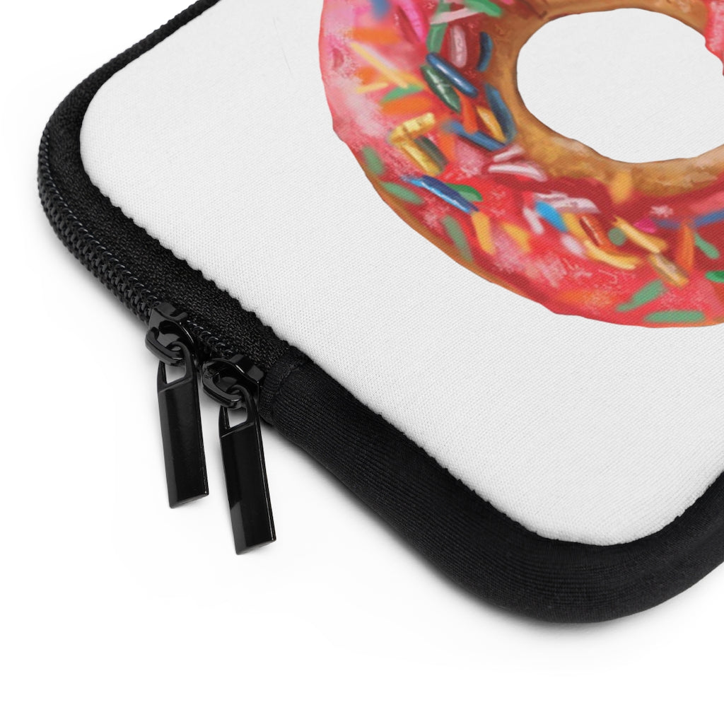 A stylish donut-themed laptop sleeve with a black polyester back, featuring dual zippers and water-resistant neoprene material.