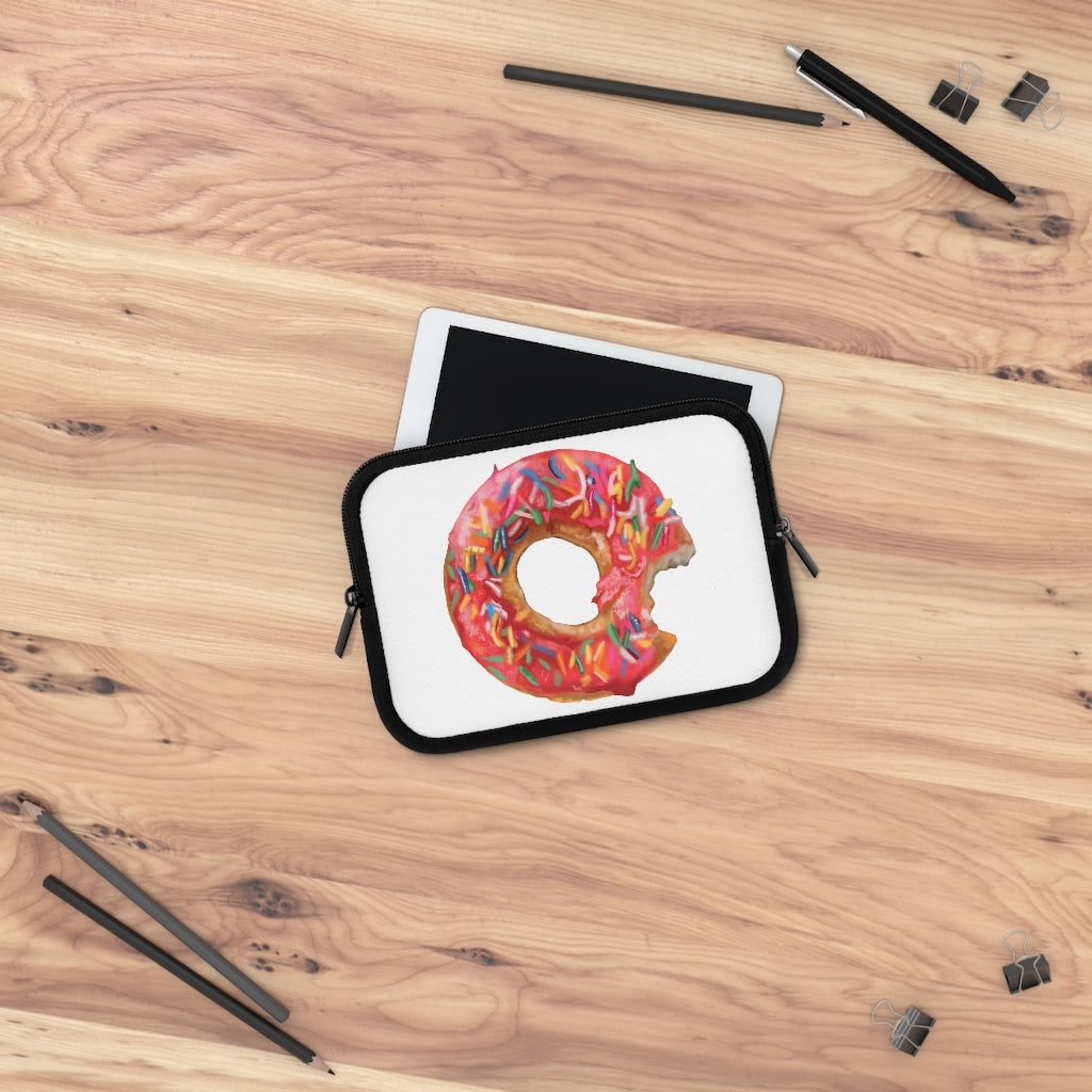 A stylish donut-themed laptop sleeve with a black polyester back, featuring dual zippers and water-resistant neoprene material.