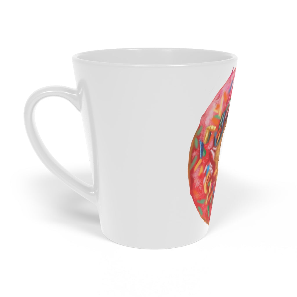 A stylish 12oz Donut Latte Mug made of durable white ceramic with a scratch-resistant finish and an easy-grip handle.