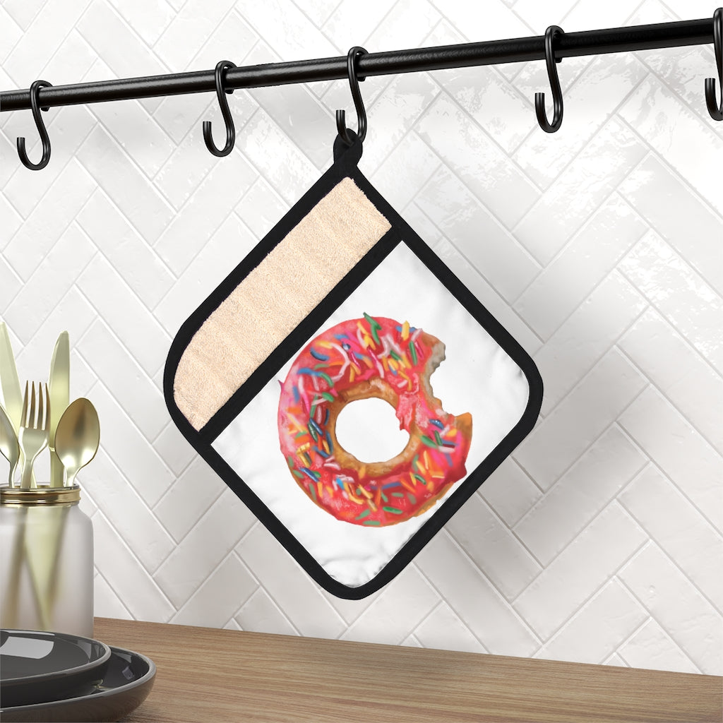 A stylish donut-themed pot holder with pocket, measuring 9x9 inches, featuring a black cotton hanging loop for easy storage.