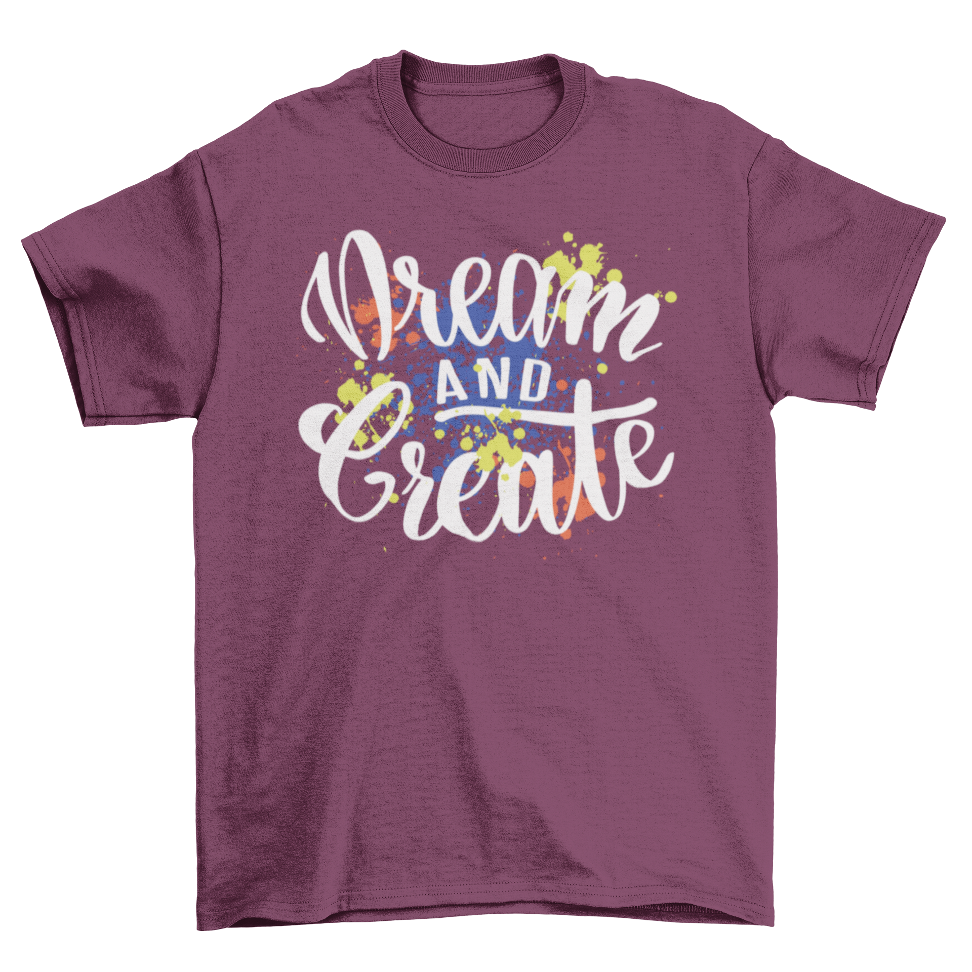 Dream Create T-shirt design featuring motivational cursive lettering surrounded by colorful paint splashes.