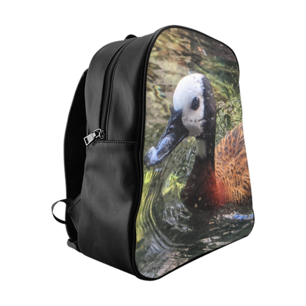 Duck School Backpack featuring a stylish duck print design, padded back, and multiple inside pockets for practical use.