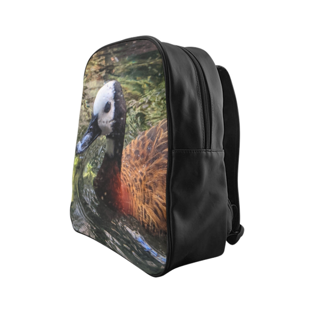 Duck School Backpack featuring a stylish duck print design, padded back, and multiple inside pockets for practical use.