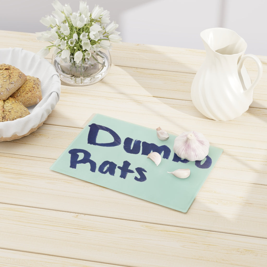 Dumbo Rats Cutting Board made of tempered glass with rubber dots for stability, featuring a whimsical design.