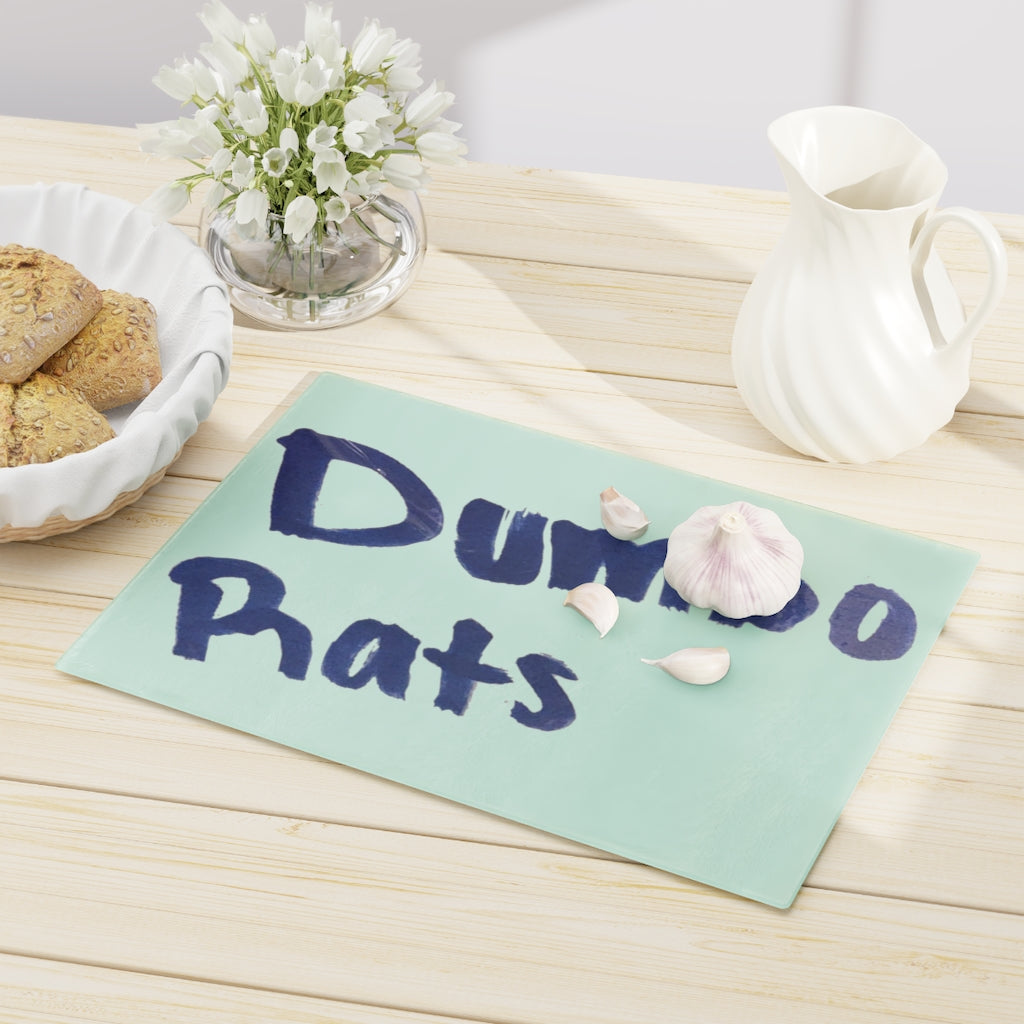 Dumbo Rats Cutting Board made of tempered glass with rubber dots for stability, featuring a whimsical design.