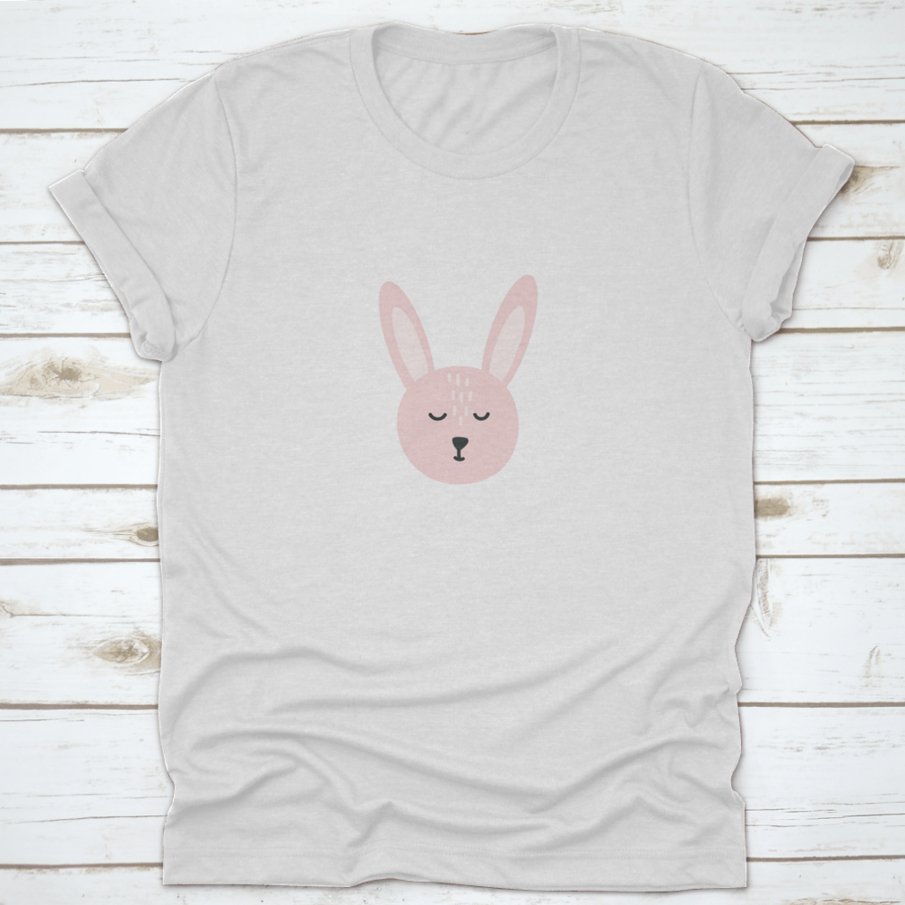 Easter Bunny T-shirt design featuring a cute bunny face with closed eyes, made from soft cotton fabric.