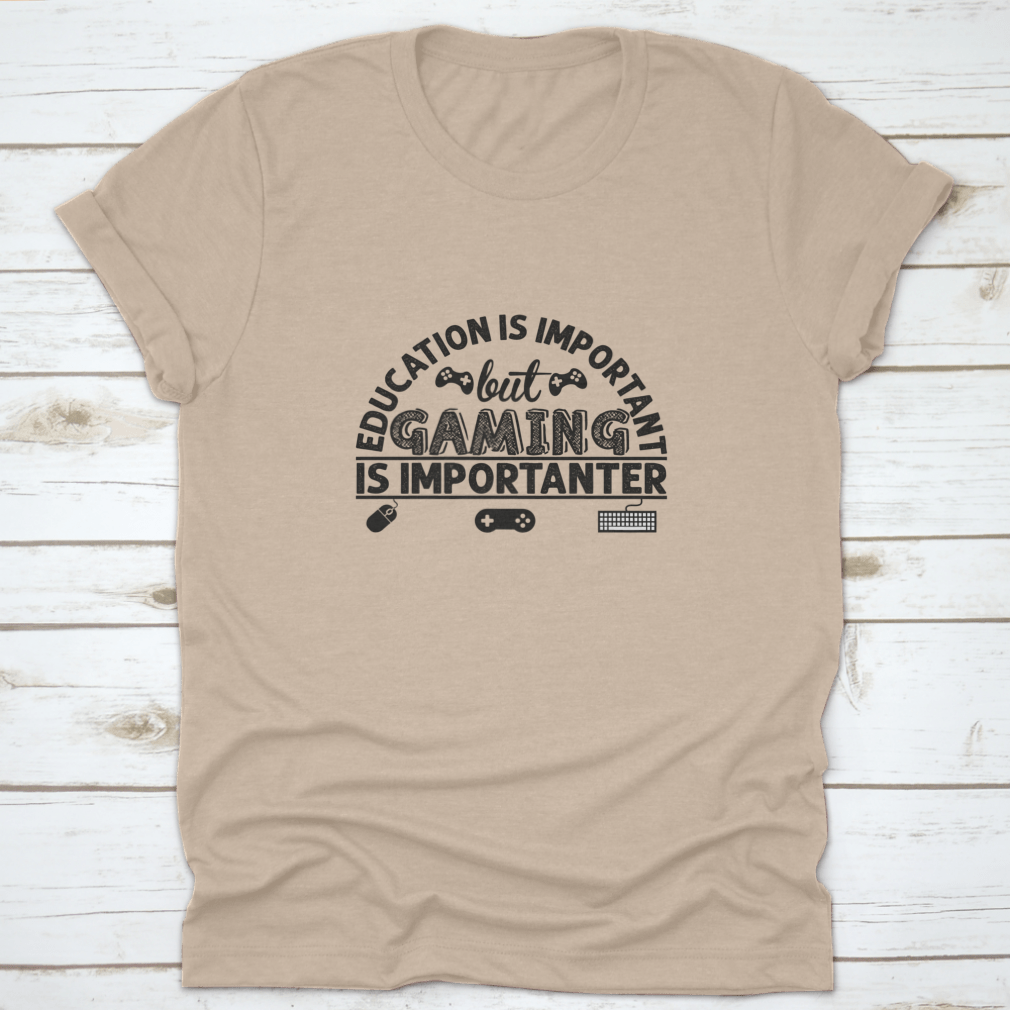 A stylish cotton t-shirt featuring the phrase 'Education Is Important But Gaming Is Importen', showcasing its comfortable fabric and classic fit.