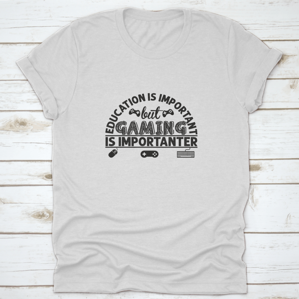 A stylish cotton t-shirt featuring the phrase 'Education Is Important But Gaming Is Importen', showcasing its comfortable fabric and classic fit.