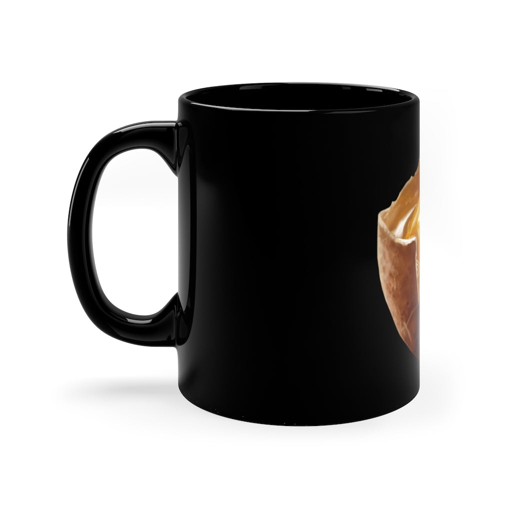 A sleek 11oz black ceramic mug with a C-handle, perfect for coffee, tea, or hot chocolate, showcasing a customizable design.