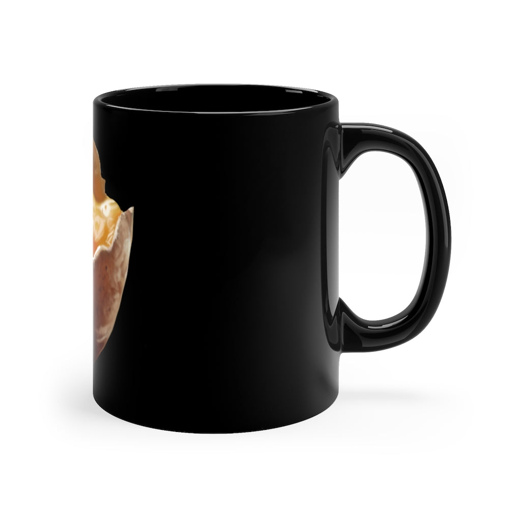 A sleek 11oz black ceramic mug with a C-handle, perfect for coffee, tea, or hot chocolate, showcasing a customizable design.