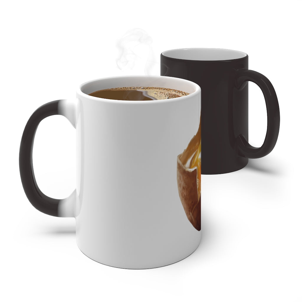 A white ceramic mug that changes color when filled with hot liquid, featuring a rounded design and C-handle.