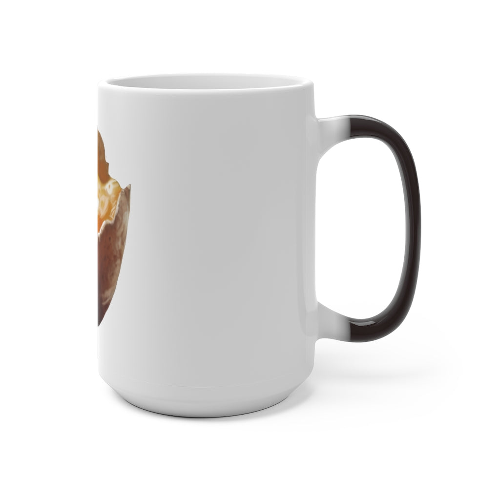 A white ceramic mug that changes color when filled with hot liquid, featuring a rounded design and C-handle.