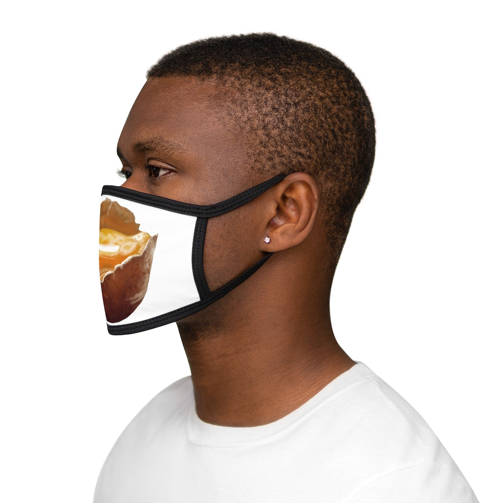 Egg Mixed-Fabric Face Mask featuring a black outer edge and earloops, with a stylish design suitable for everyday use.