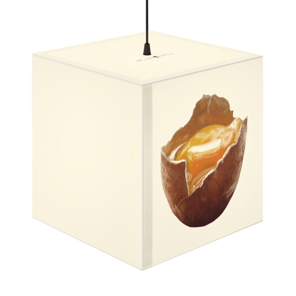 A stylish Egg Personalized Lamp in a modern setting, showcasing its unique cube design and soft glow.