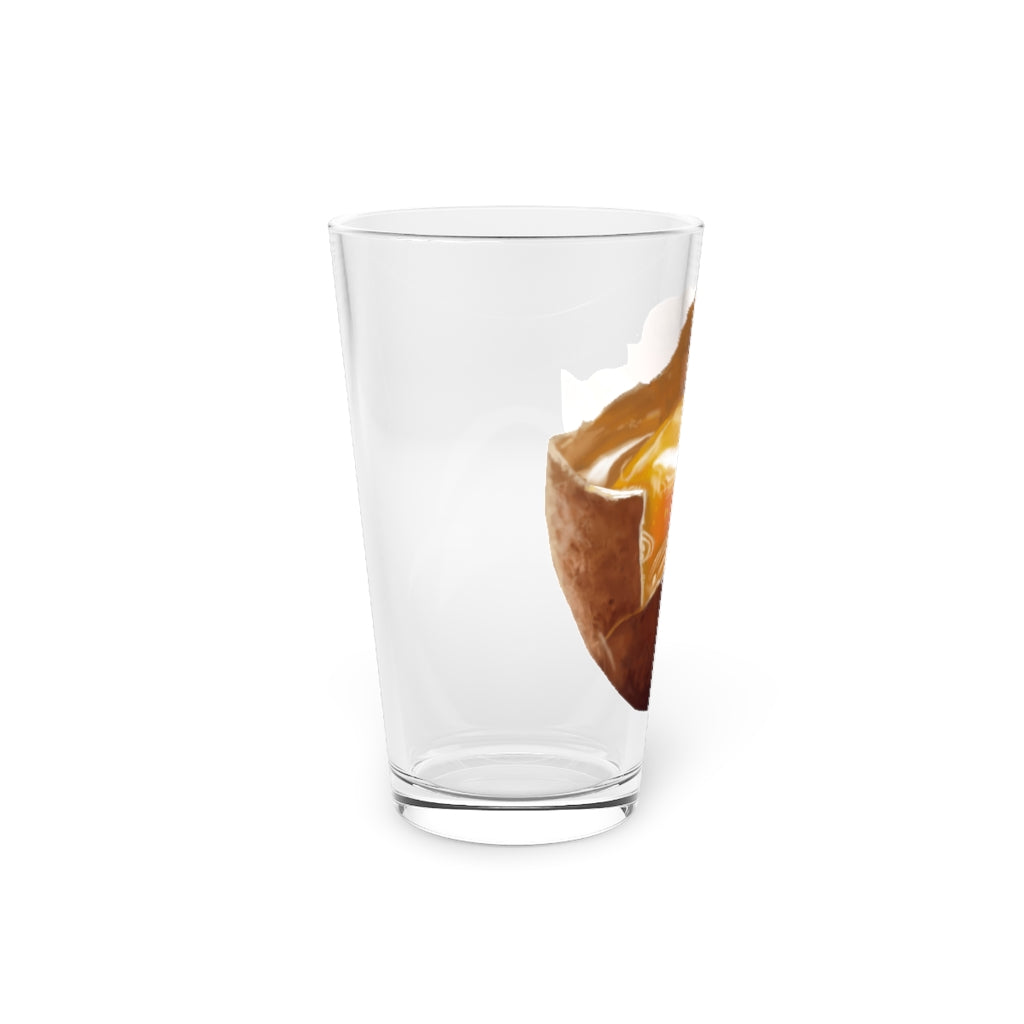 A clear 16oz Egg Pint Glass showcasing its elegant design, perfect for beverages and personalization.