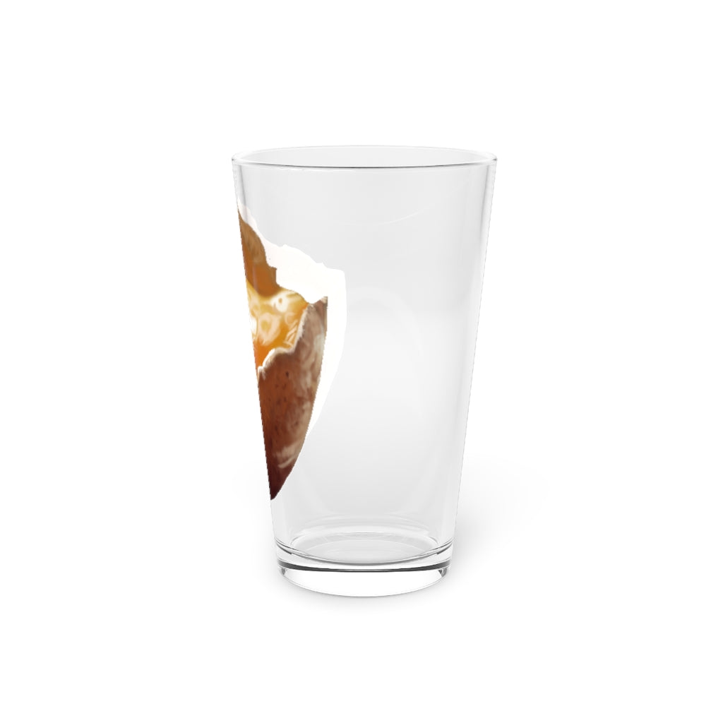 A clear 16oz Egg Pint Glass showcasing its elegant design, perfect for beverages and personalization.