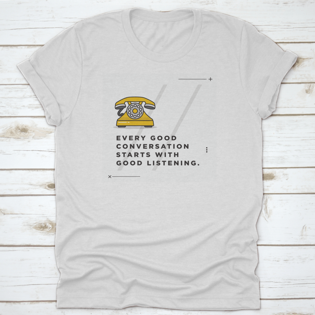 A soft cotton t-shirt featuring the inspirational quote 'Every Good Conversation Starts With Good Listening' in a stylish font.