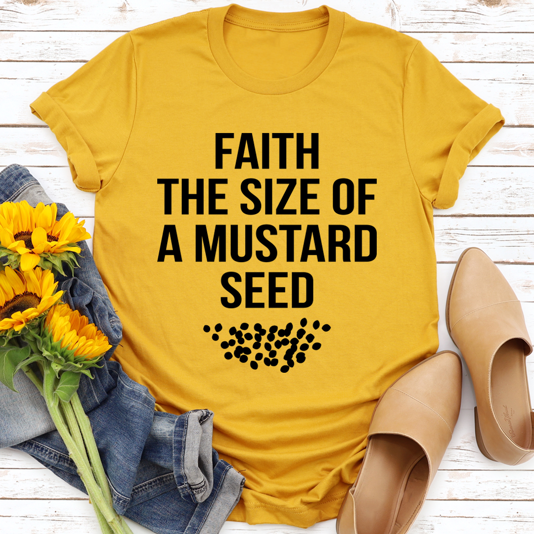 A soft and durable Faith The Size Of A Mustard Seed T-Shirt, featuring a meaningful design and double-stitched neckline.