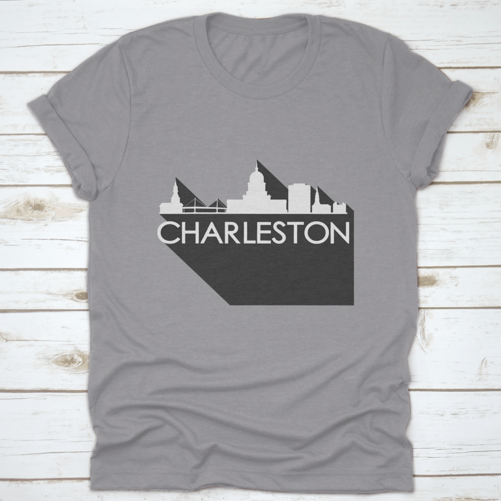 White t-shirt featuring a flat icon skyline silhouette of famous buildings in Charleston, showcasing a stylish design.