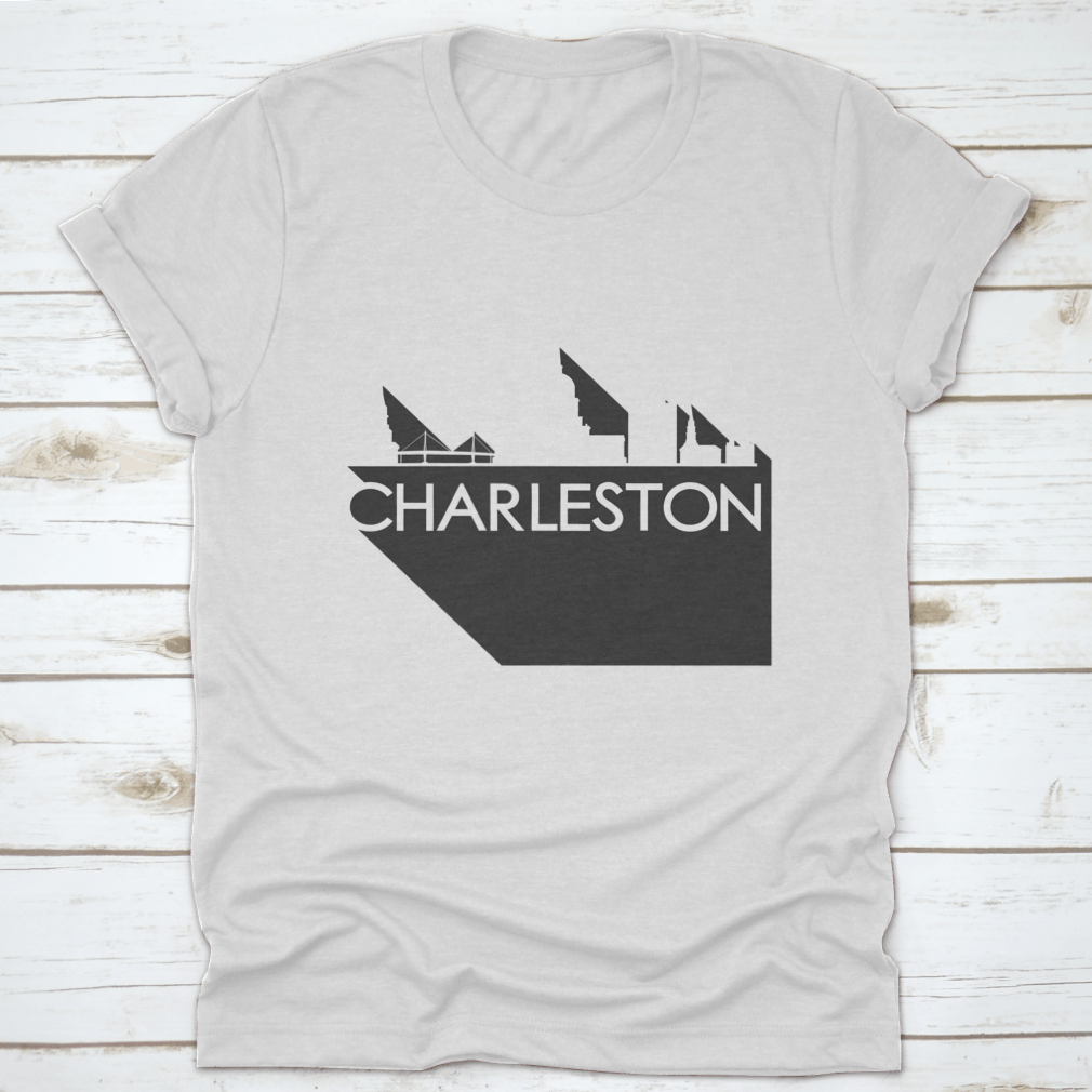 White t-shirt featuring a flat icon skyline silhouette of famous buildings in Charleston, showcasing a stylish design.