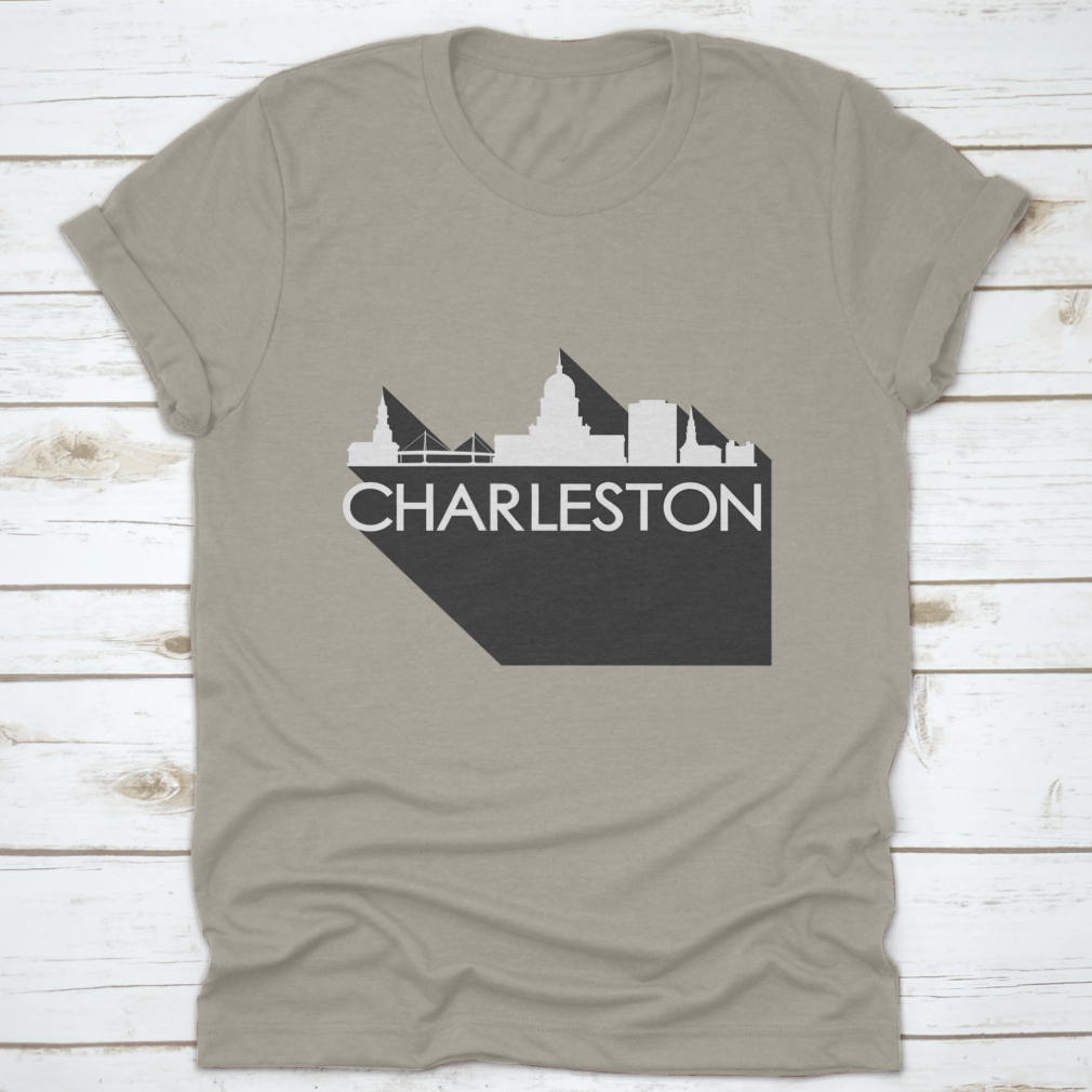 White t-shirt featuring a flat icon skyline silhouette of famous buildings in Charleston, showcasing a stylish design.