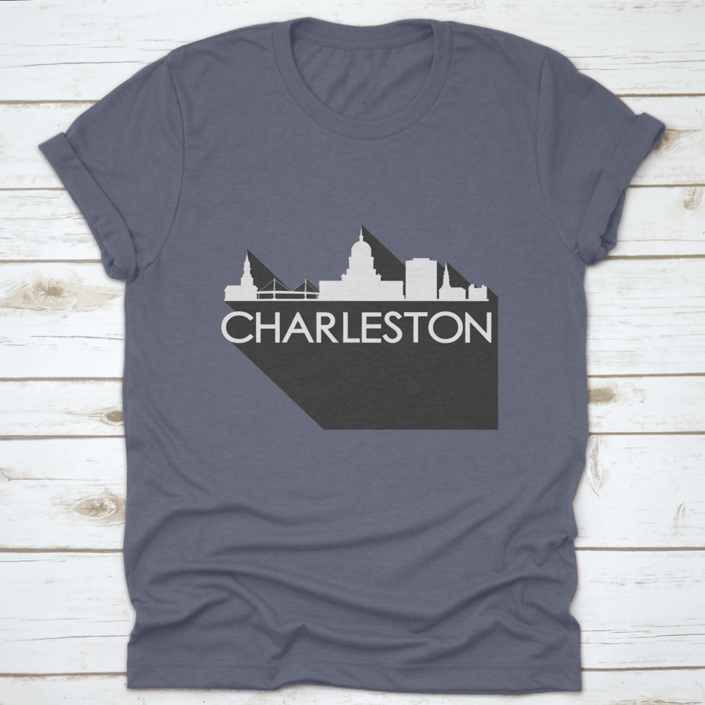 White t-shirt featuring a flat icon skyline silhouette of famous buildings in Charleston, showcasing a stylish design.