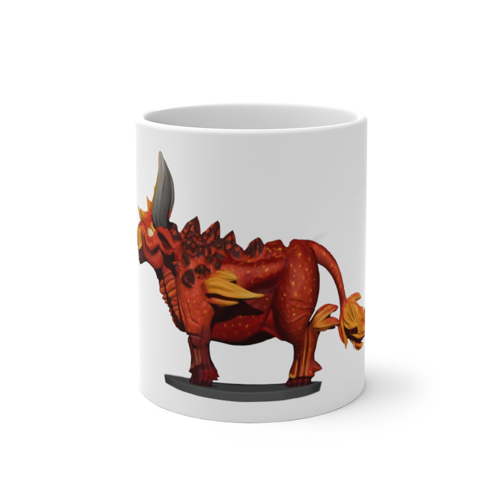 Fire Bull Color Changing Mug showcasing its vibrant color transformation when filled with hot liquid, featuring a white ceramic body and C-handle.