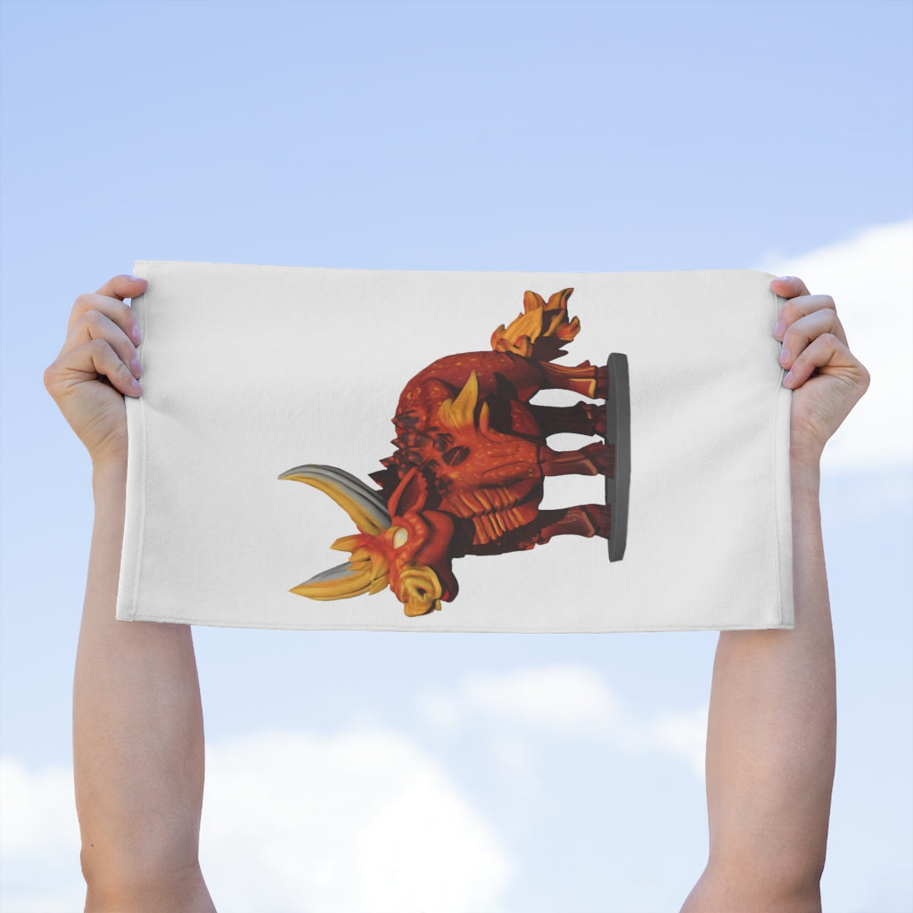 Fire Bull Rally Towel measuring 11x18 inches, featuring a soft polyester front and absorbent cotton backing, ideal for sports events.