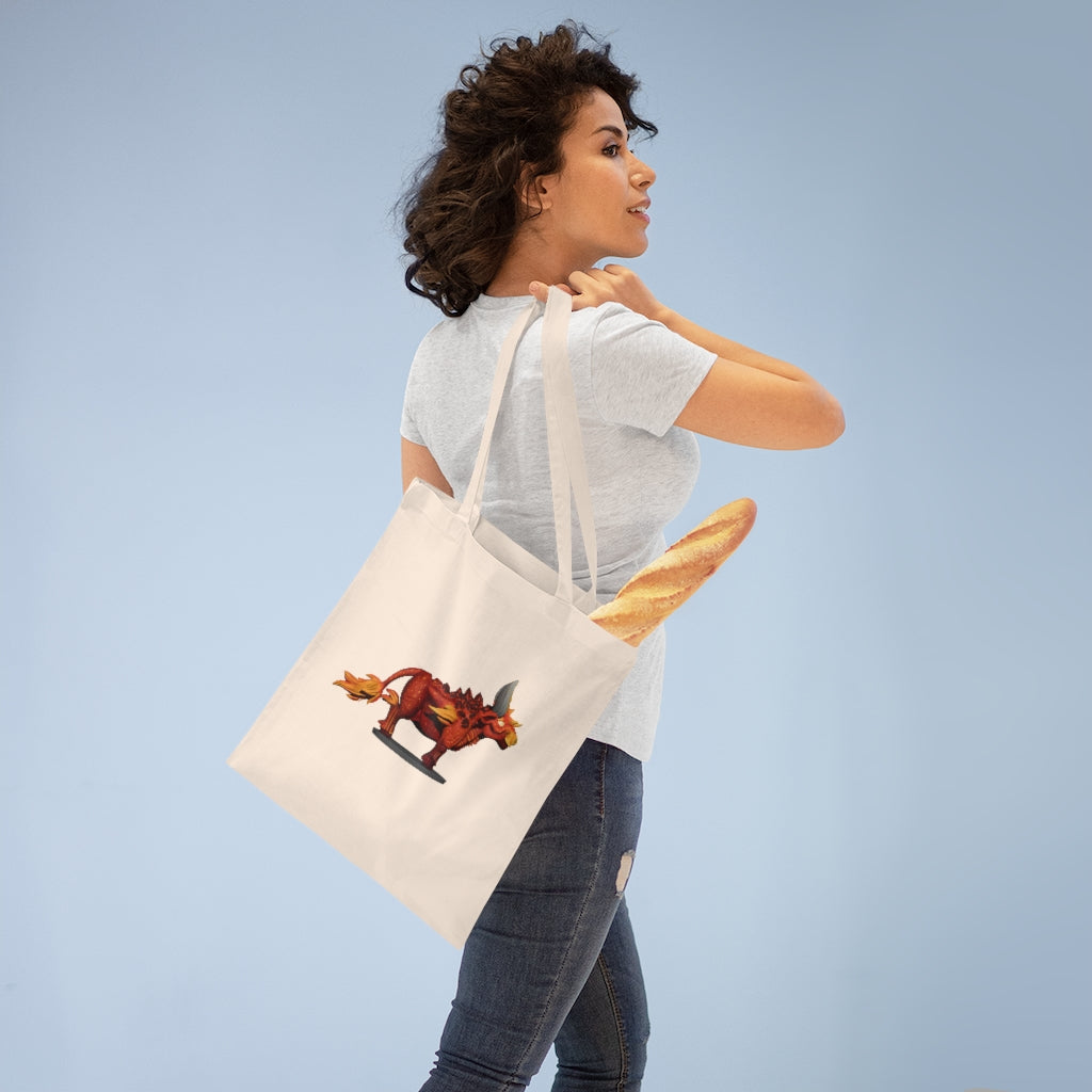 Fire Bull Tote Bag made of 100% cotton with long handles and cross stitching, available in multiple colors.