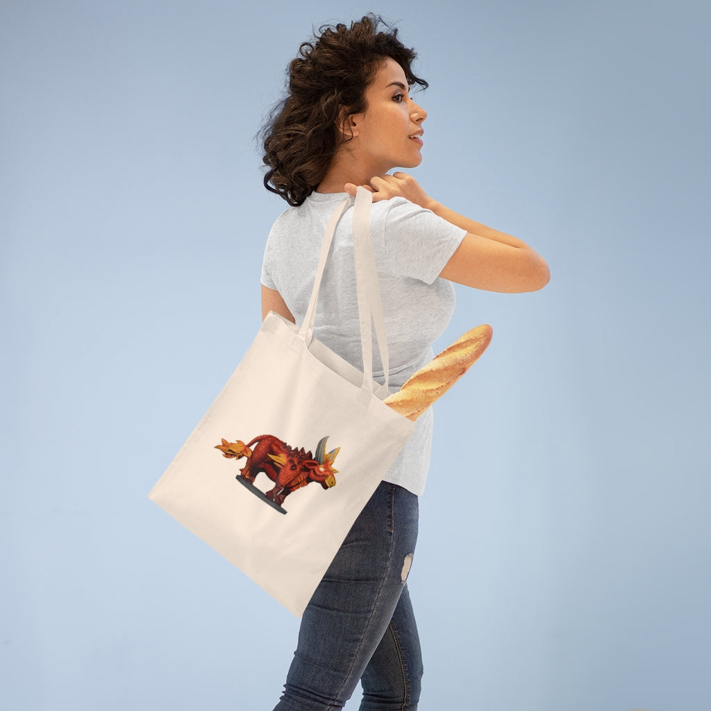 Fire Bull Tote Bag made of 100% cotton with long handles and cross stitching for added stability, available in multiple colors.