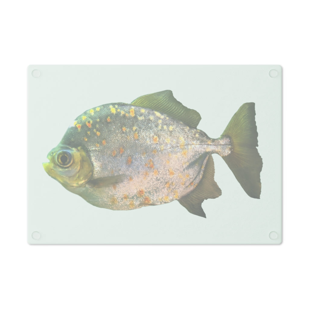 A stylish Fish with Specs Cutting Board made of tempered glass, featuring a unique fish design and four rubber dots for stability.