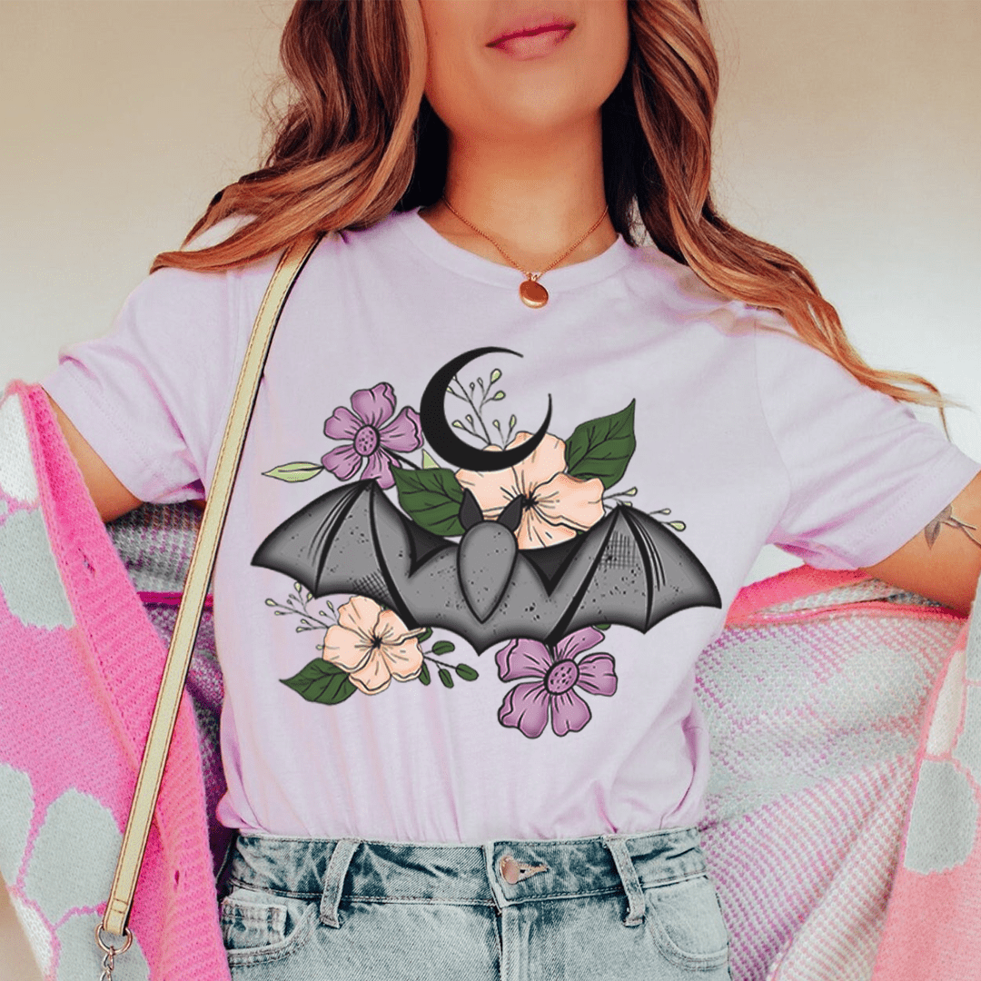 Floral Bat T-Shirt featuring a whimsical bat design on a soft cotton fabric, perfect for casual wear.