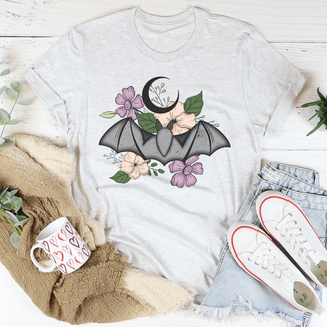 Floral Bat T-Shirt featuring a whimsical bat design on a soft cotton fabric, perfect for casual wear.