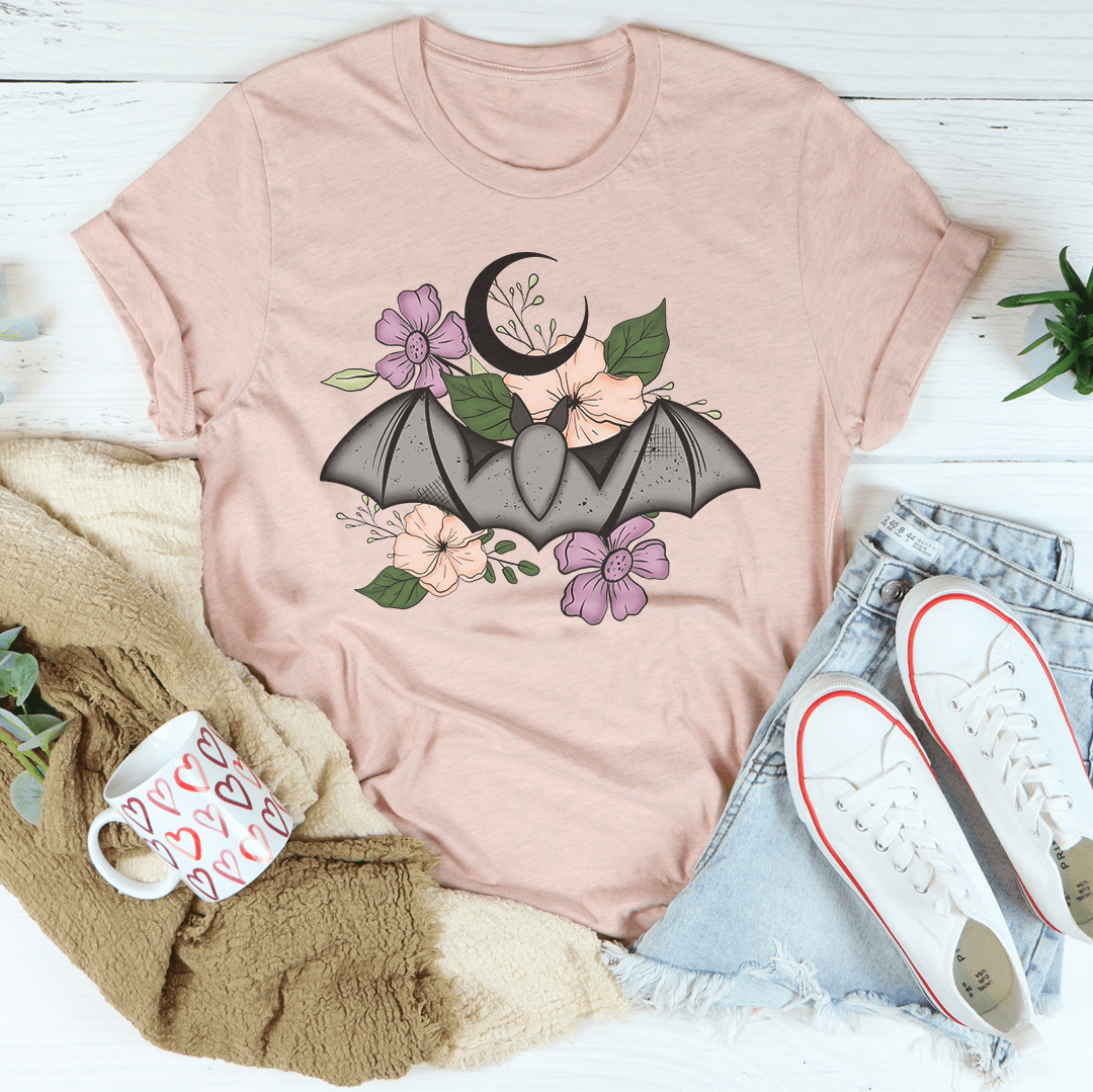 Floral Bat T-Shirt featuring a whimsical bat design on a soft cotton fabric, perfect for casual wear.