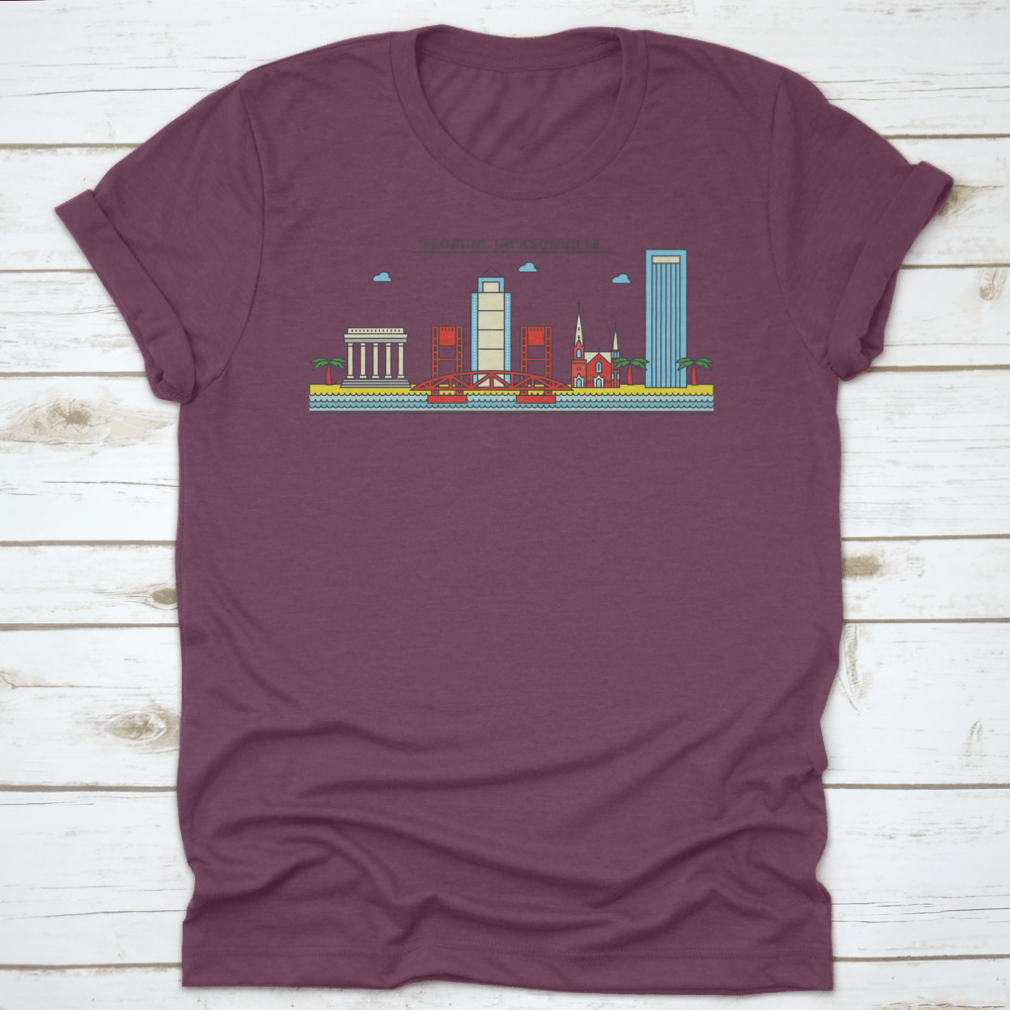 A stylish t-shirt featuring the Jacksonville City Skyline, showcasing iconic architecture and buildings in vibrant colors.