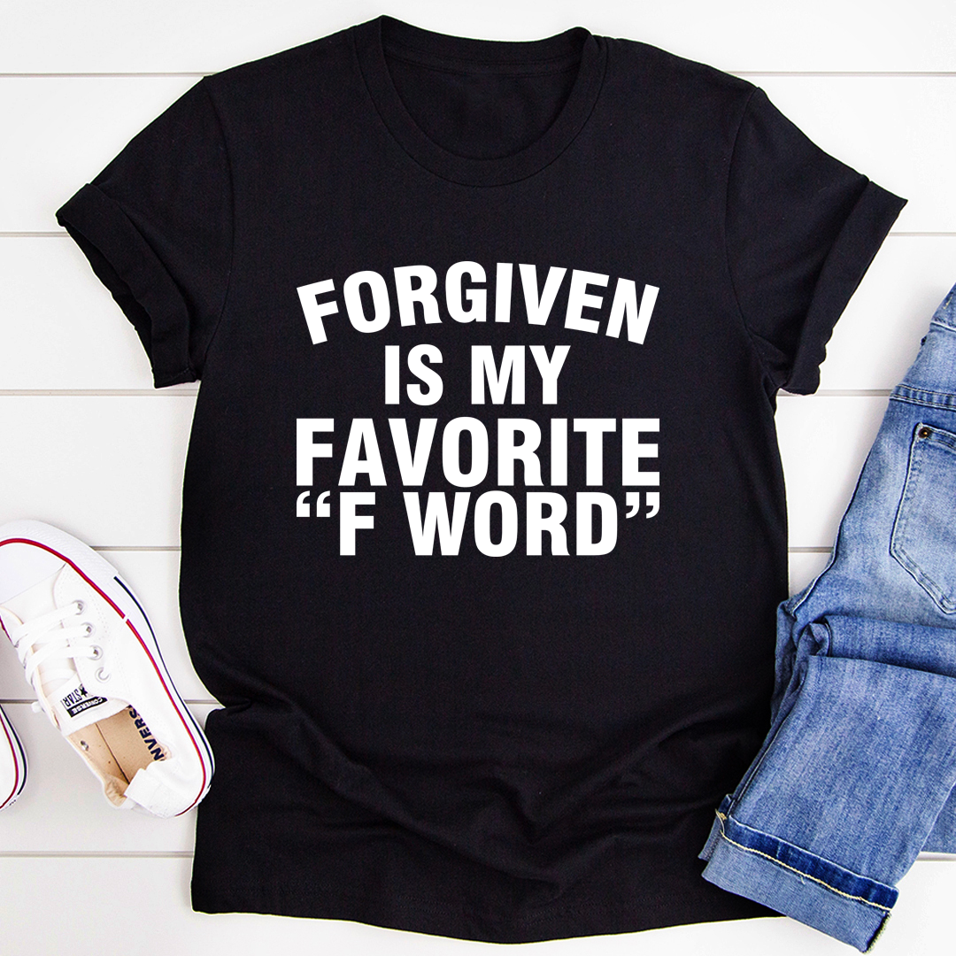 A stylish black t-shirt featuring the phrase 'Forgiven Is My Favorite F Word' printed in bold letters, showcasing its soft fabric and durable stitching.