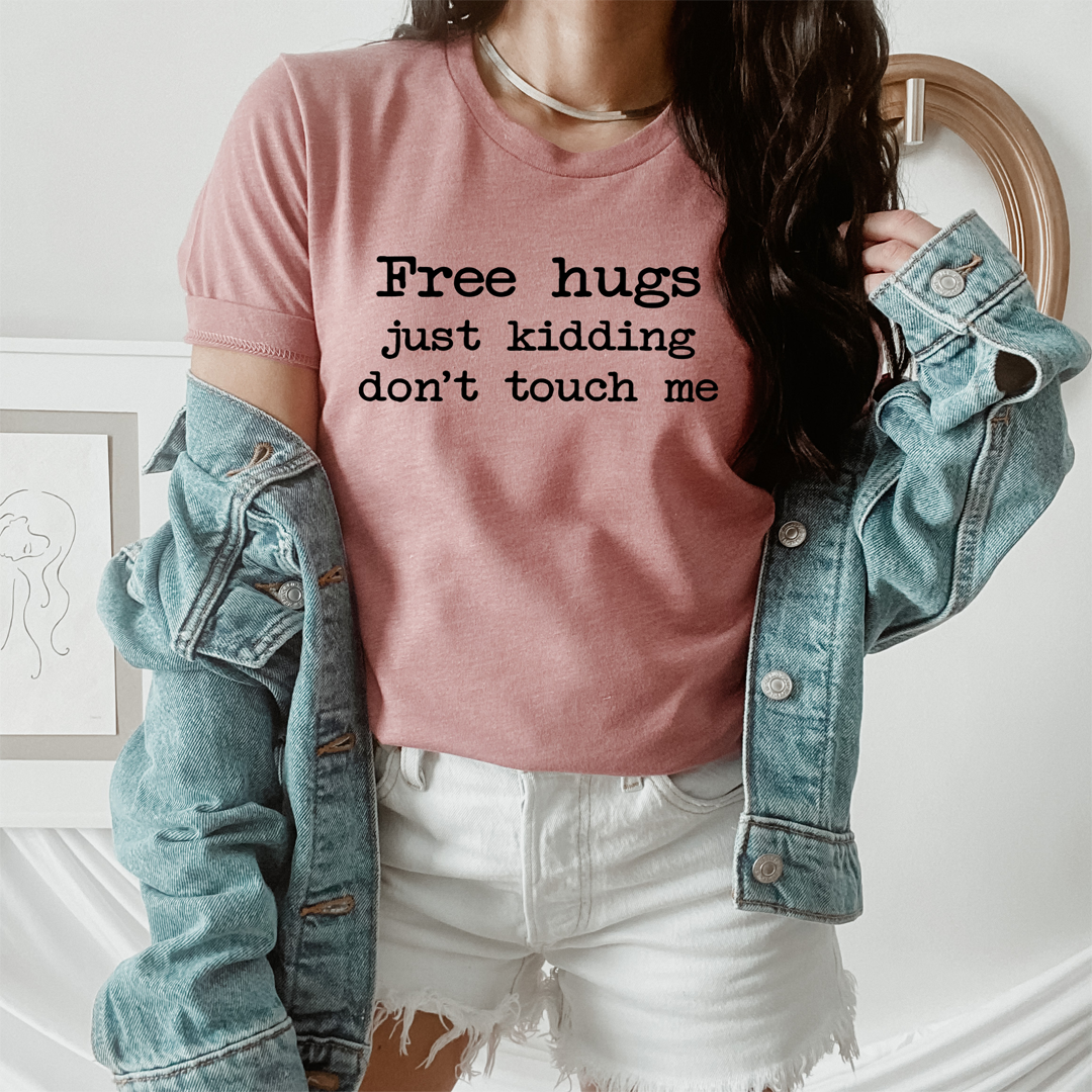 A soft and durable Free Hugs T-Shirt made from 100% ring-spun cotton, featuring double stitching for added durability.