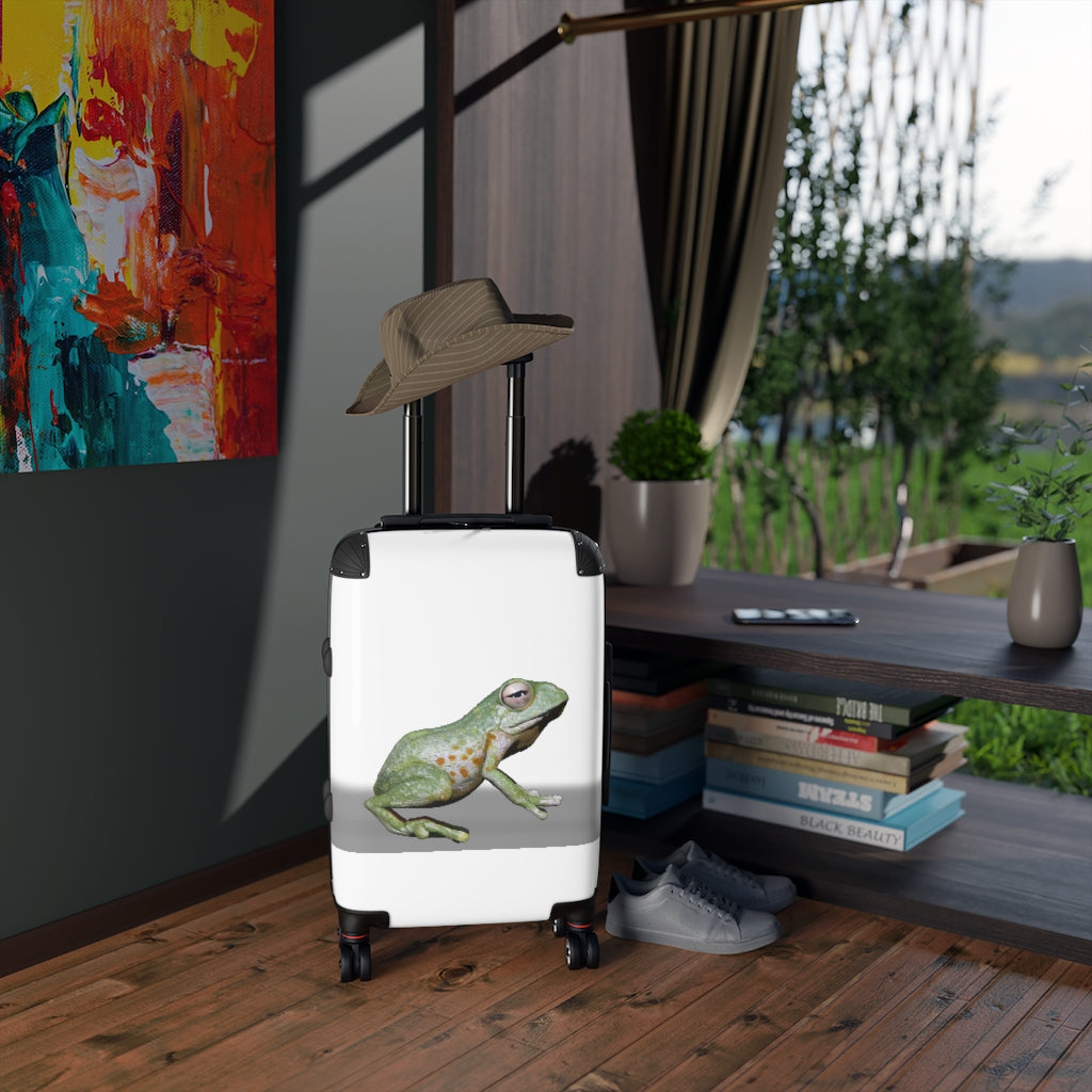 Frog Cabin Suitcase featuring personalized design, adjustable handle, and durable faux leather material.