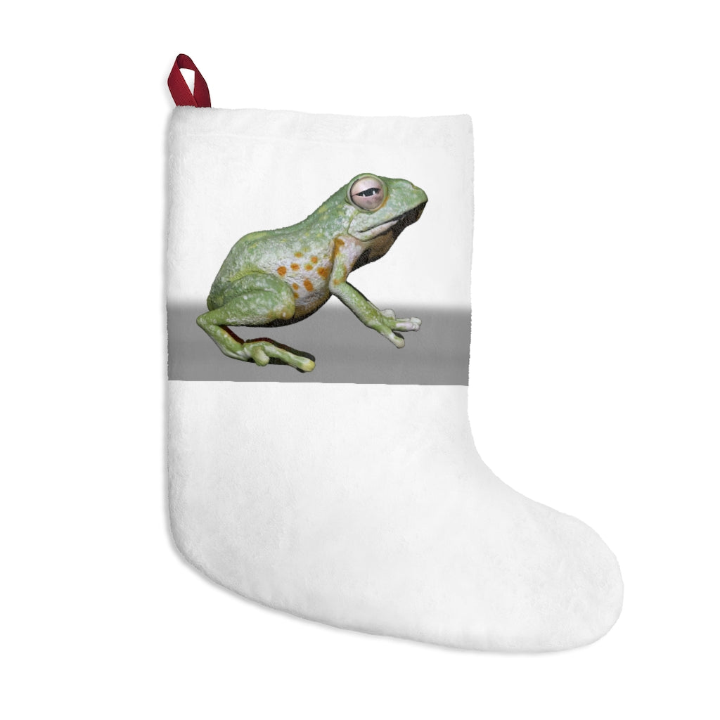 A cozy Frog Christmas Stocking made of soft polyester fleece, featuring a festive design and a twill ribbon hanging loop.