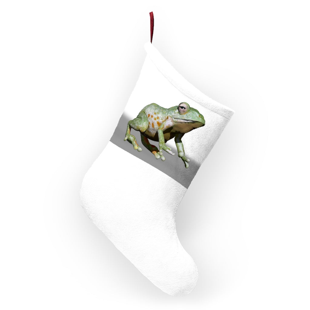 Personalized Frog Christmas Stockings hanging by a fireplace, featuring festive designs and a twill ribbon loop.