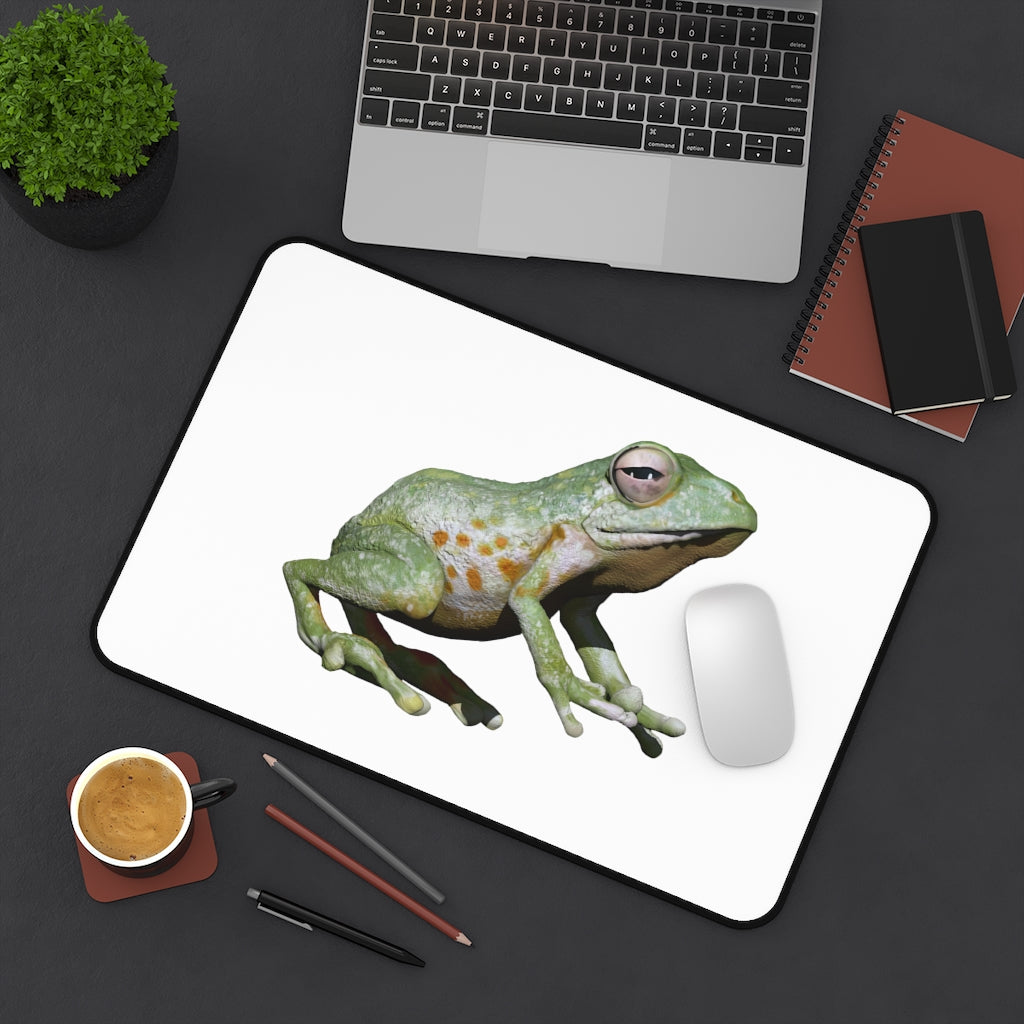 A vibrant Frog Desk Mat featuring a customizable design, made of durable neoprene with anti-slip backing, perfect for home or office use.