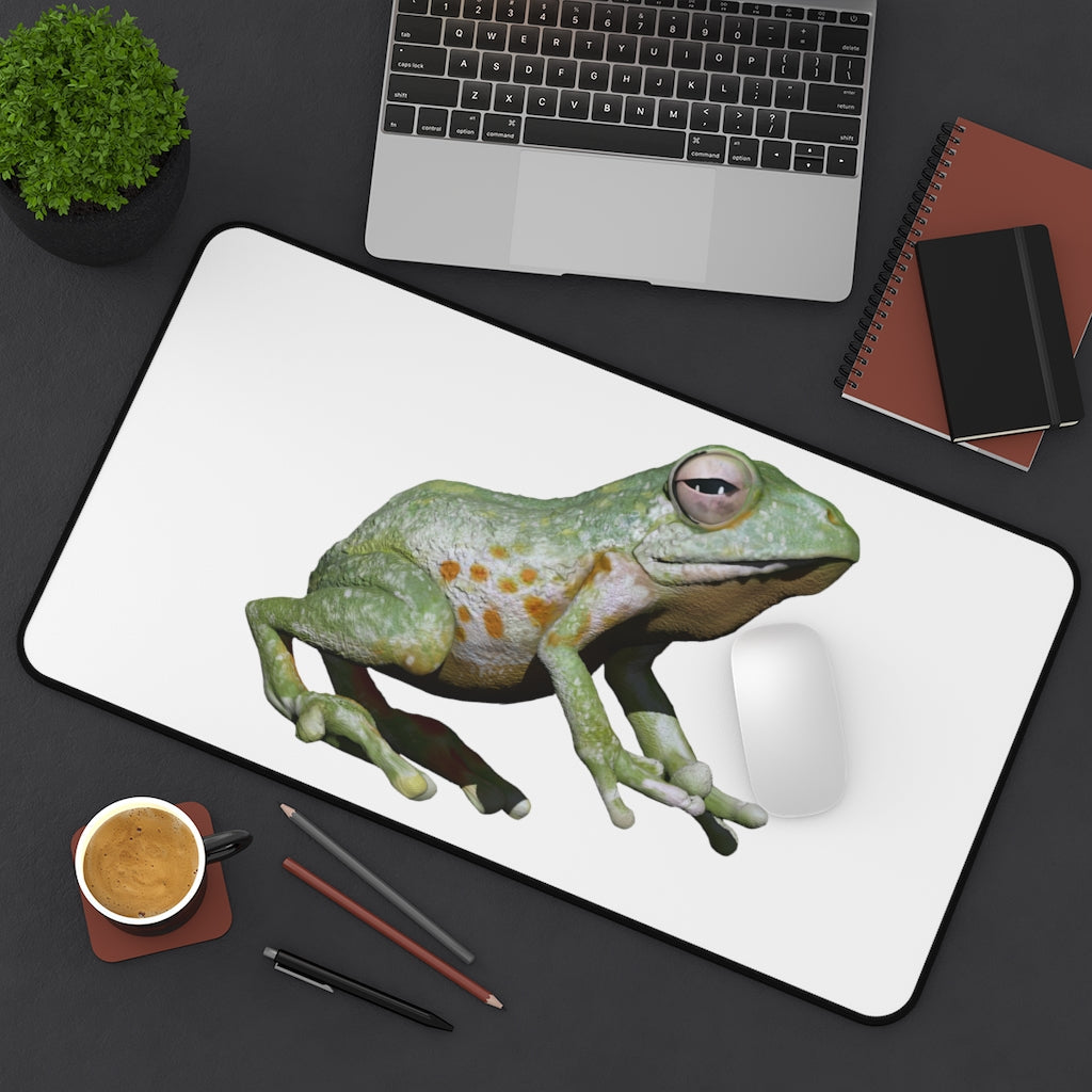 A vibrant Frog Desk Mat featuring a customizable design, made of durable neoprene with anti-slip backing, perfect for home or office use.